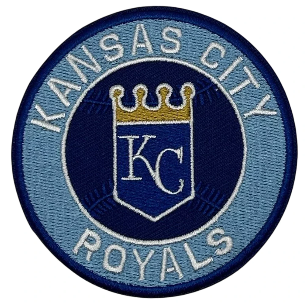 This Round embroidered Kansas City Royals vintage round logo patch showcasing a dark navy center shield with white KC initials and gold crown, enclosed by a light blue ring reading Kansas City Royals.