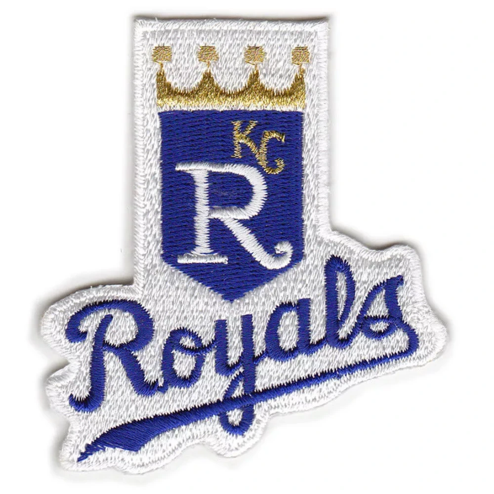 This embroidered Kansas City Royals logo patch showcasing a royal blue crown shield with a white 'R' above a prominent blue cursive 'Royals' script on a white background.